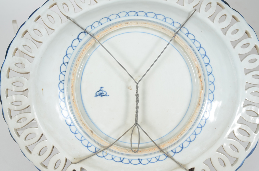 A pair of oval porcelain Imari dishes, Japan — Back of one dish with makers mark (?)