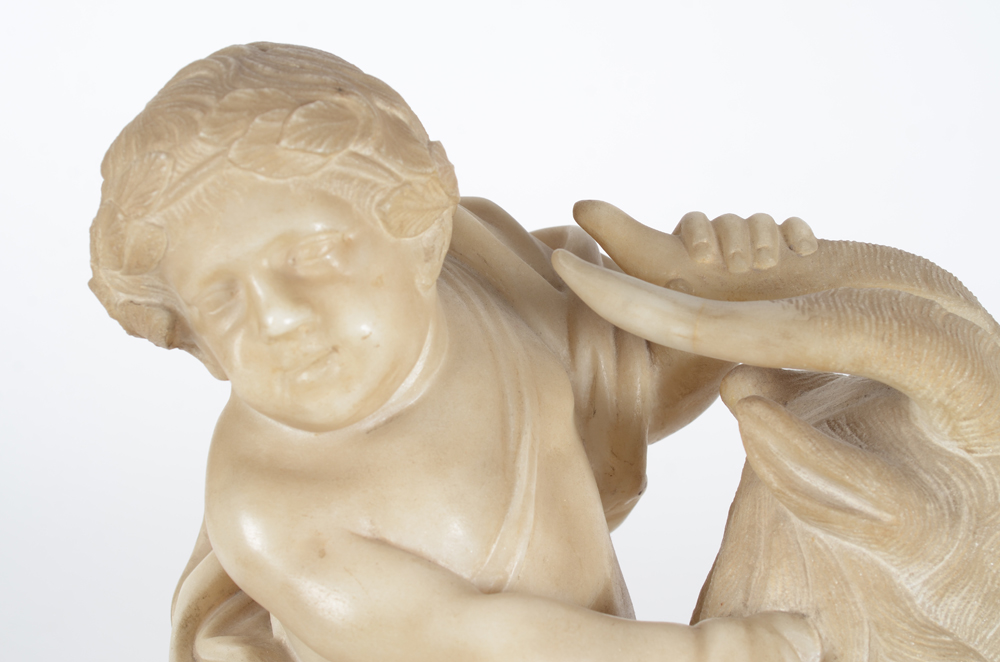 the infant bacchus riding a billy goat, an albaster sculpture — Detail of the bacchus figure