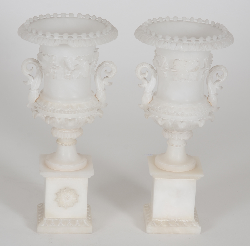 a pair of fine alabaster Medici-shaped vases, ca. 1870 — One of the vases with the back visible