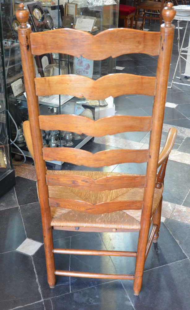 A High back arm chair — Back of the chair