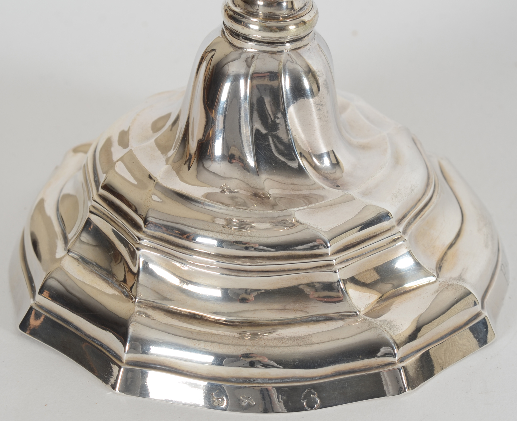 Philippus I. De Clercq, a slender handcrafted L XV 18th century silver candlestick, Ghent, 1777 — <p>Base of the candlestick</p>