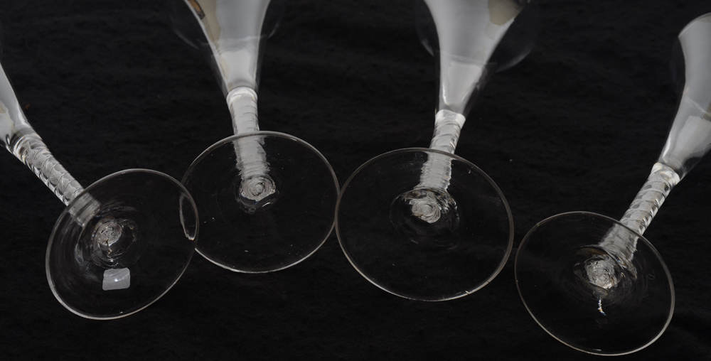 4 English air twist flute wine glasses, 18th century — Detail of the bases