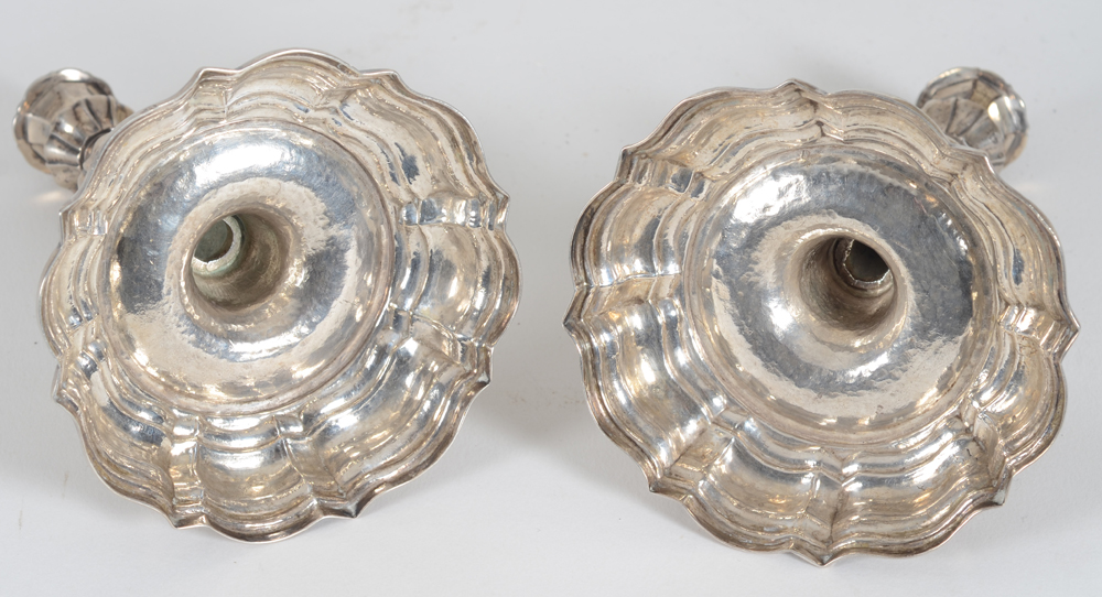 A good pair of mid-eightteen century silver desk candlesticks, Vienna — View of the udnerside of the bases