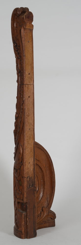 An 18th century hand carved oak staircase newel post — Part towards the staircase and handrail