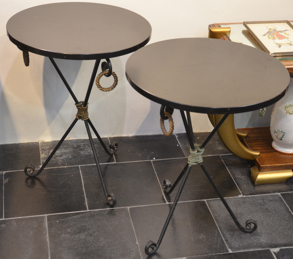 A pair of metal and Noir the Mazy side tables — Une paire de tables en fer forgé et cuivre, tablette en noir de mazy