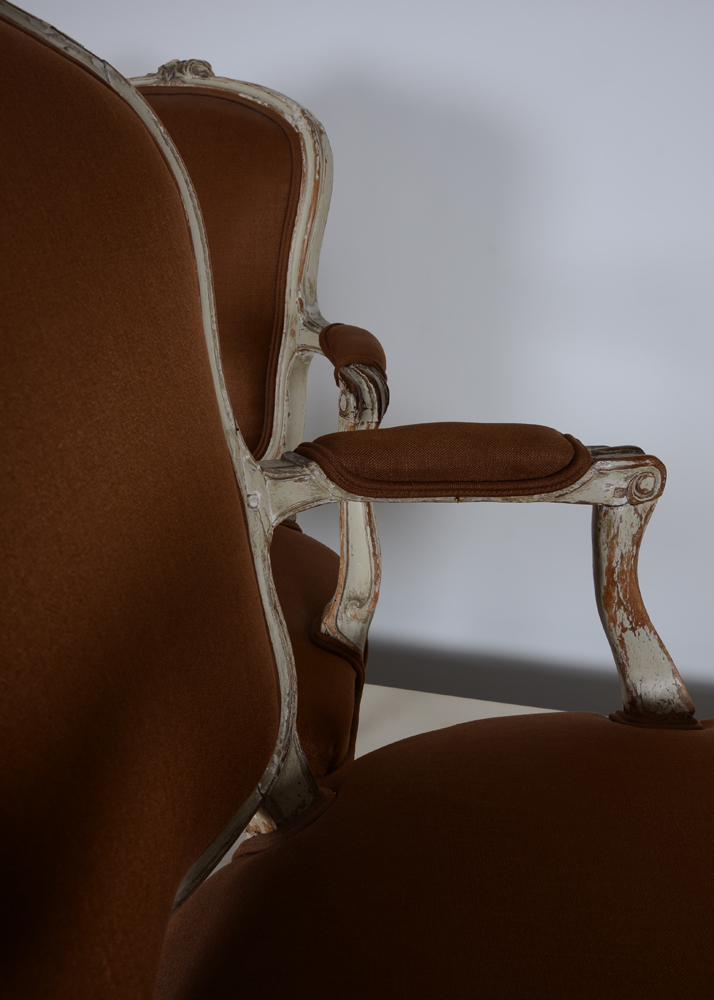 A pair of LXV patinated wood armchairs, possibly from the period — Detail of the armrests