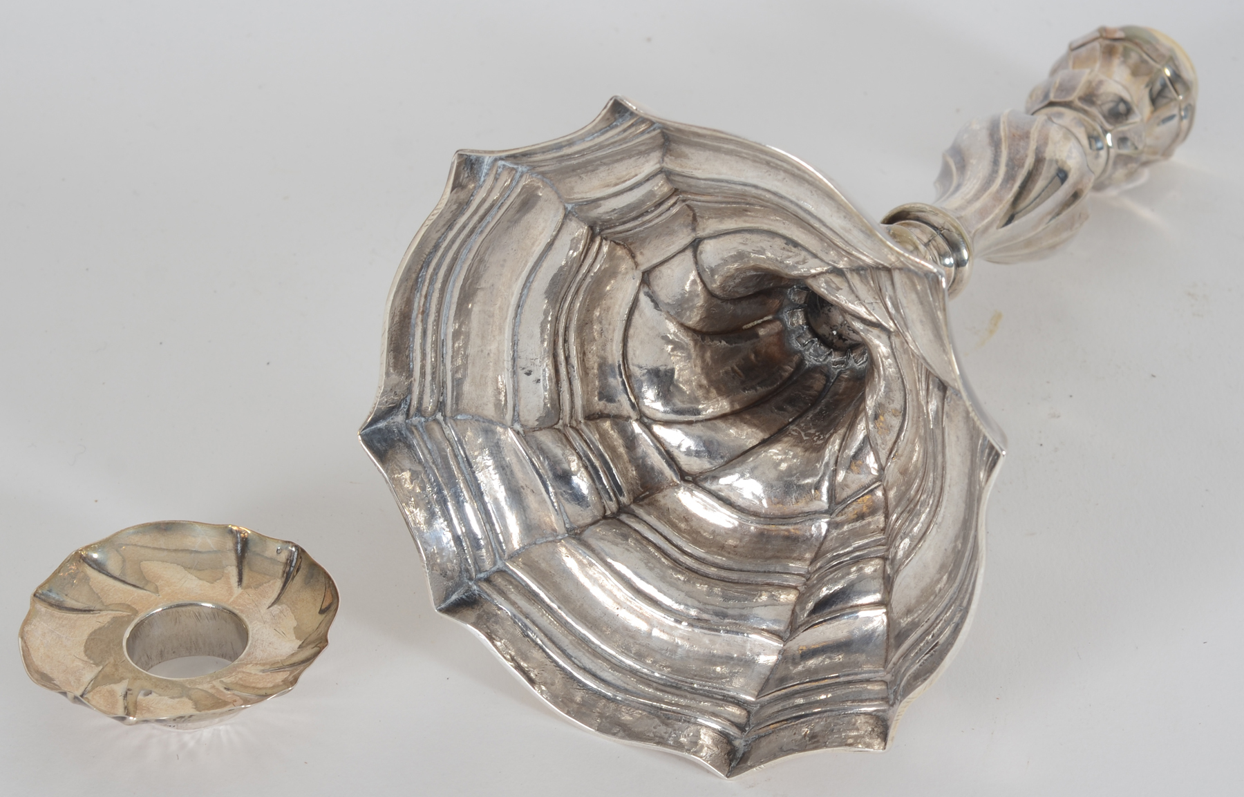 Joannes Baptista MS Paulus (Stuyck  2793-2796), A good handcrafted L XV 18th silver candlestick 1775 — <p>Bottom of the base, showing the hammering</p>