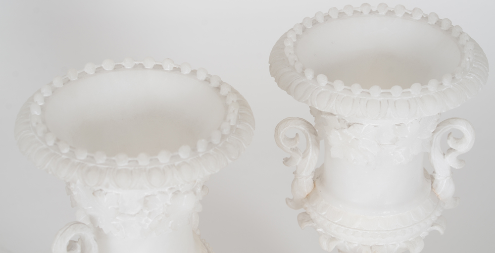 a pair of fine alabaster Medici-shaped vases, ca. 1870 — Detail of the carved rim