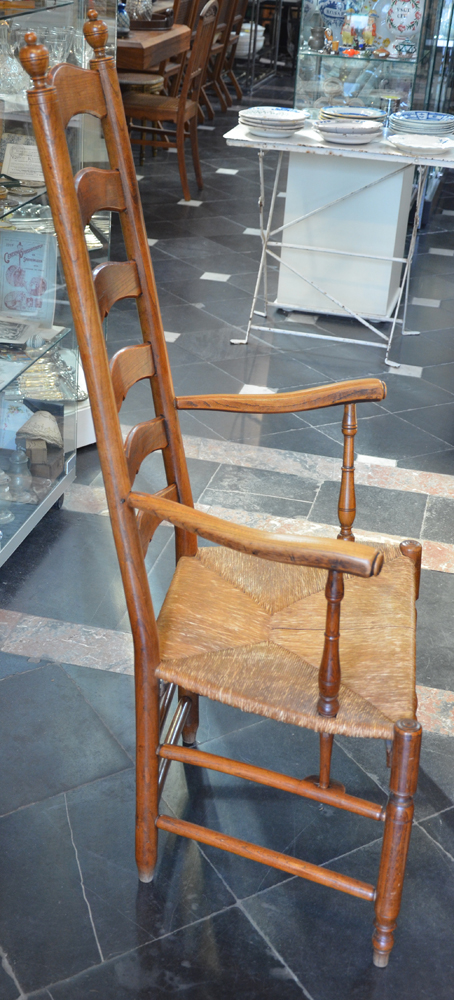 A High back arm chair — Side view