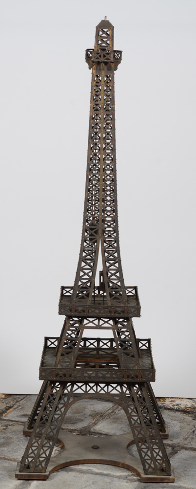 A vintage riveted copper maquette of the Eiffel Tower — Frontal view