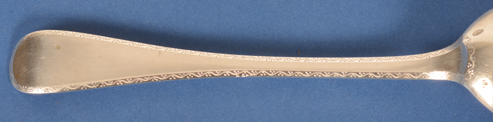 serving spoon Augsburg — the back of the spoon, showing the decorative engraving