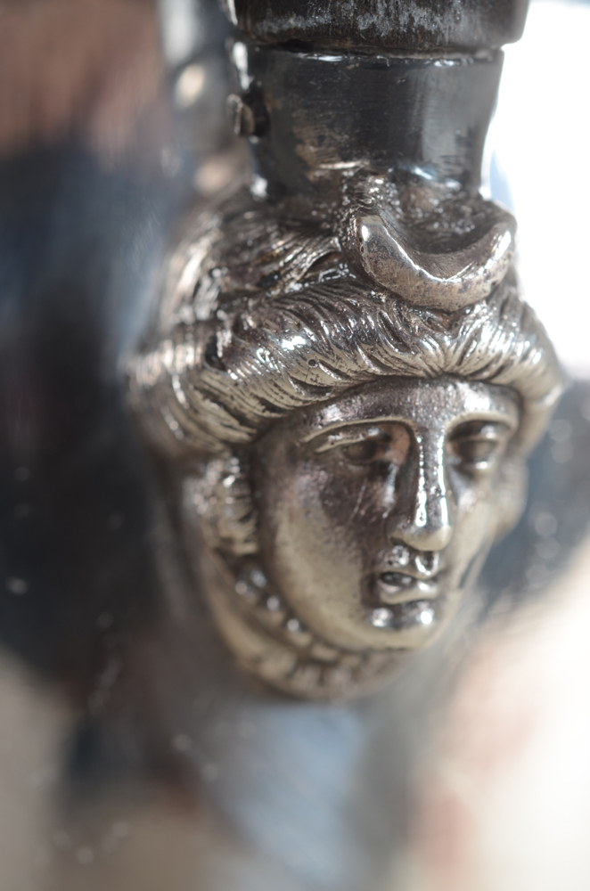 J. E. Coffinet Horse's head coffee pot — Detail of the face underneath the wooden handle