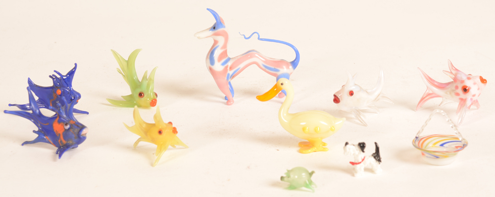 bimini glass animals — A collection of glass animals of different sizes.