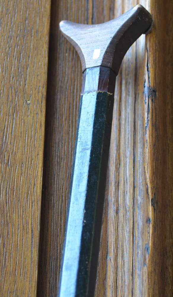 A wooden blow pipe — Detail of the top