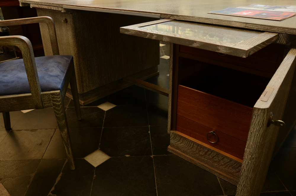 De Coene Freres — One cabinet open, showing the drawers and a notepad with glass inset that slides under the top.