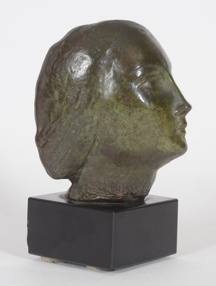 Geo Vindevogel — Rare petite tête de femme en bronze patiné, probablement des années '50.