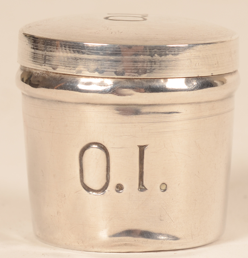 Holy oil container — Frontal view showing some of the dents in the silver