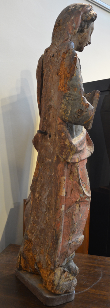 A large polychromed oak baroque sculpture of a female saint — Back of the sculpture