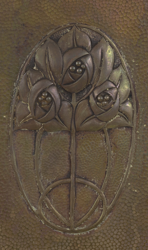 A rare art deco copper embossed fire screen attributed to De Coene, 1920's — detail of the central decoration, reminiscent of a Secession motif