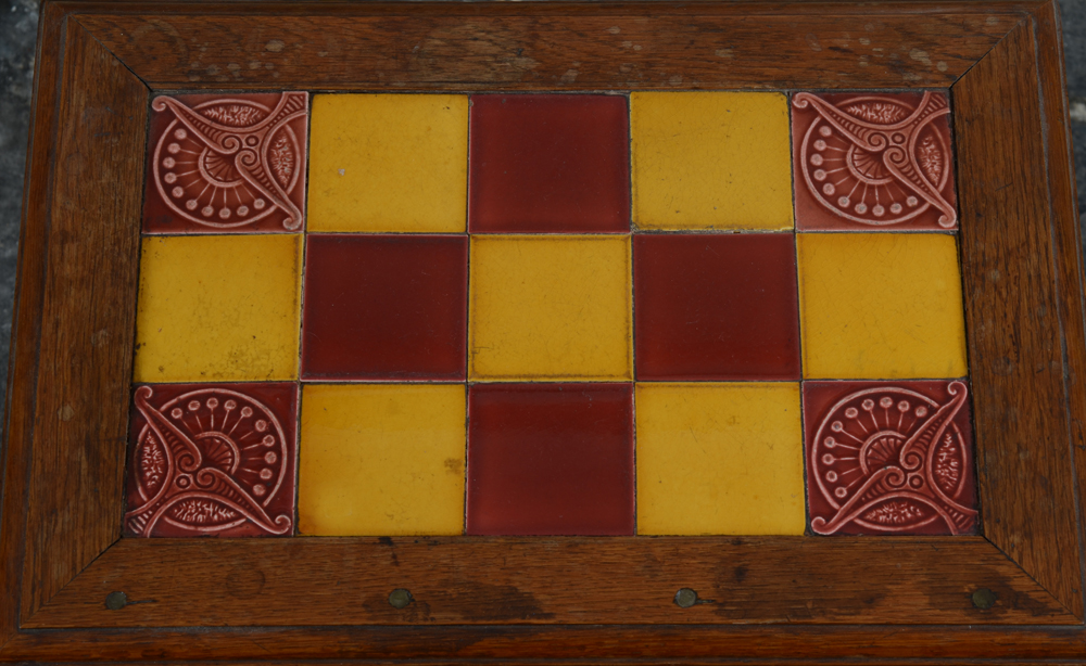 small art nouveau table with tile top — The table top with English tiles