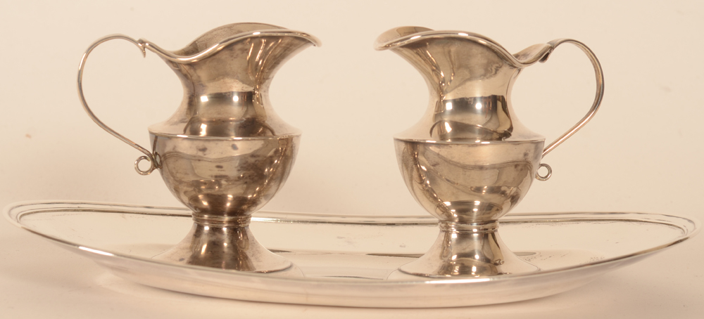 Liaigre, Tournai, silver wine and water jugs on dish — Pure-lined, elegant curves by Charles or Jacques Liaigre, silversmiths in Tournai, belgium