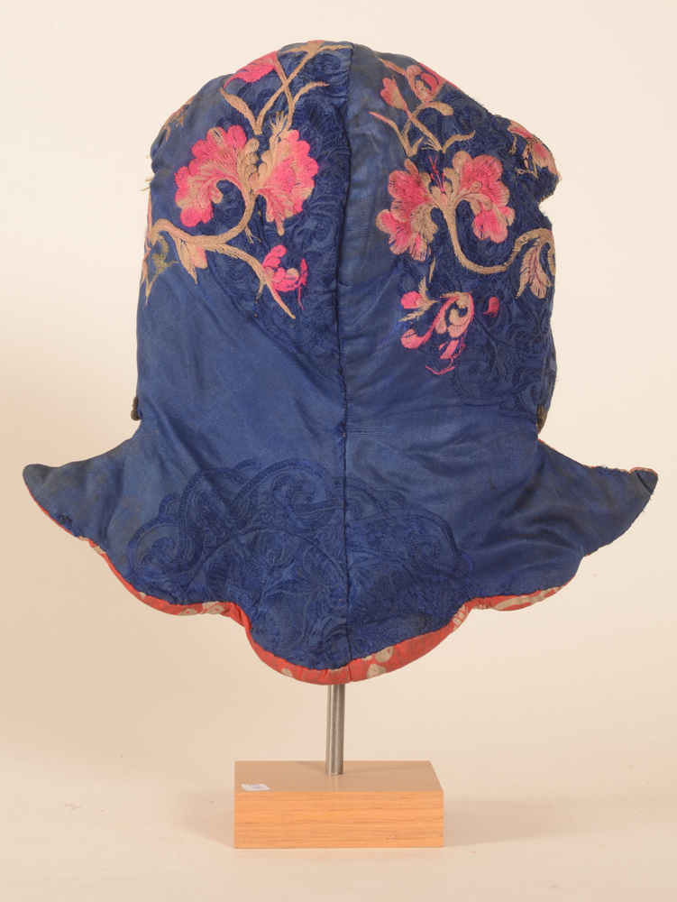Miao blue silk embroidered newborn's cap — Comes with the stand