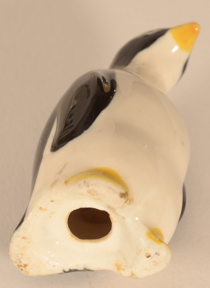 Porcelain penguin salts — Detail of the base, some still have a cork closing (and vintage salt on the inside...)
