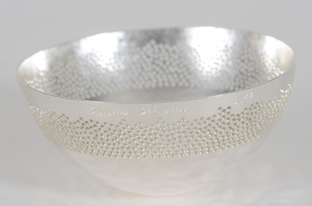 Helena Schepens, Hole Bowl, 2026, the multiple art object in sterling silver — The signature and numbering of the artist on the side, near the rim