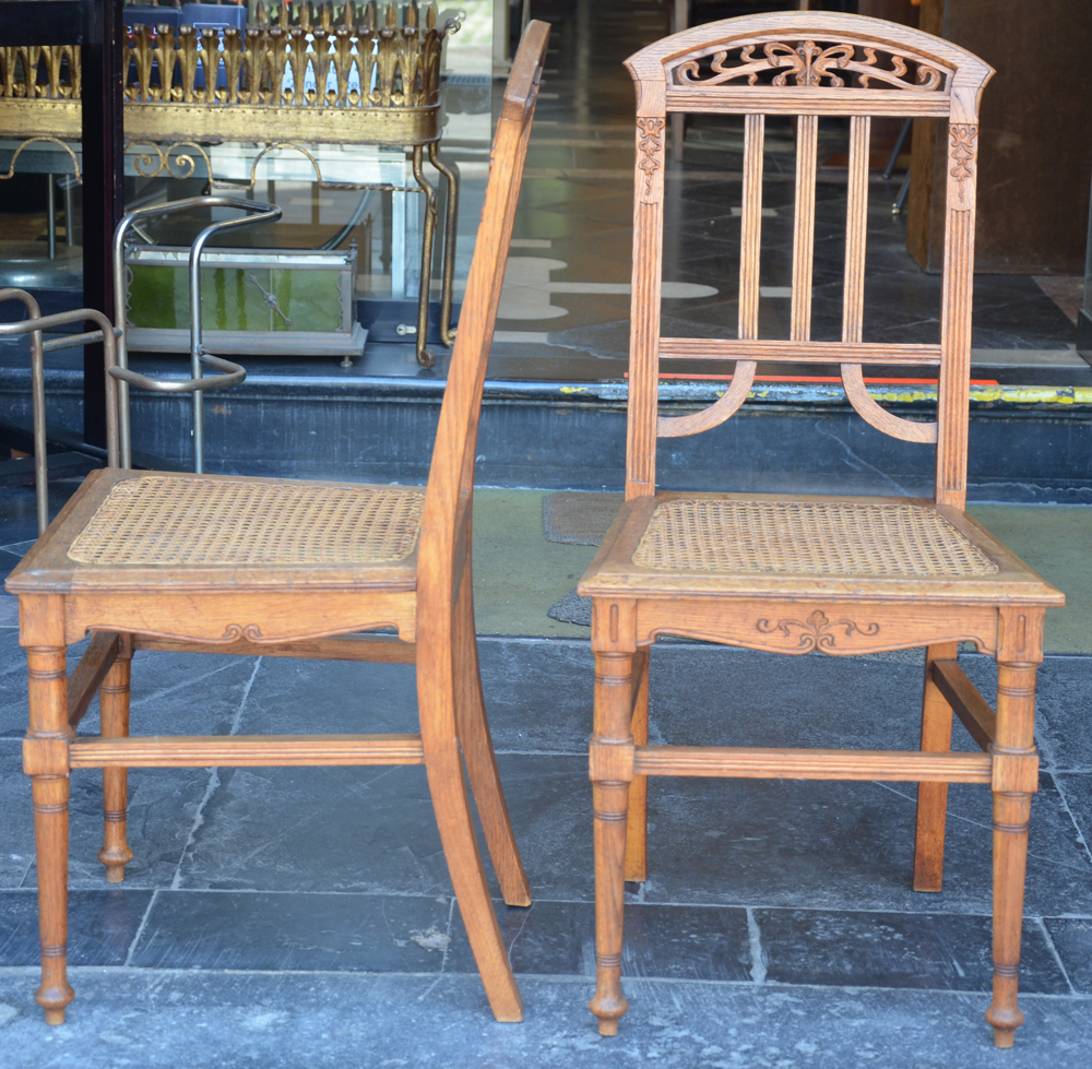a pair of handmade art nouveau chairs in oak, Belgium, ca. 1900 — Front and side view