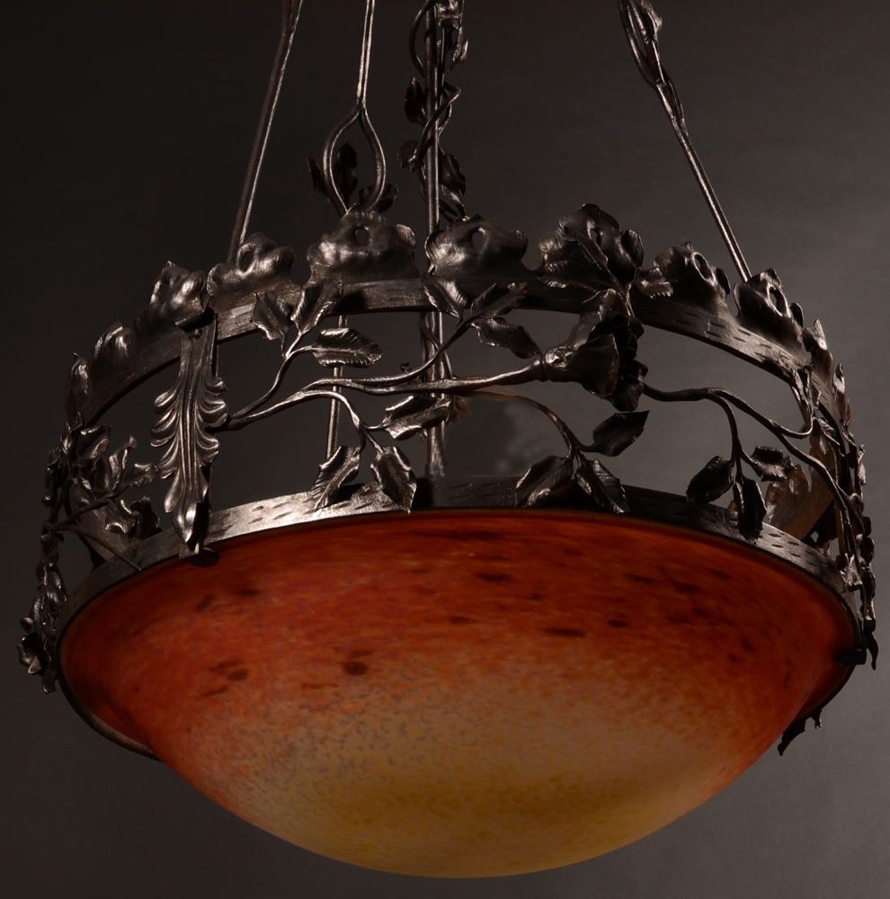 Schneider celing light — Schneider ceiling light in its patinated wrought iron frame, photographed by day.