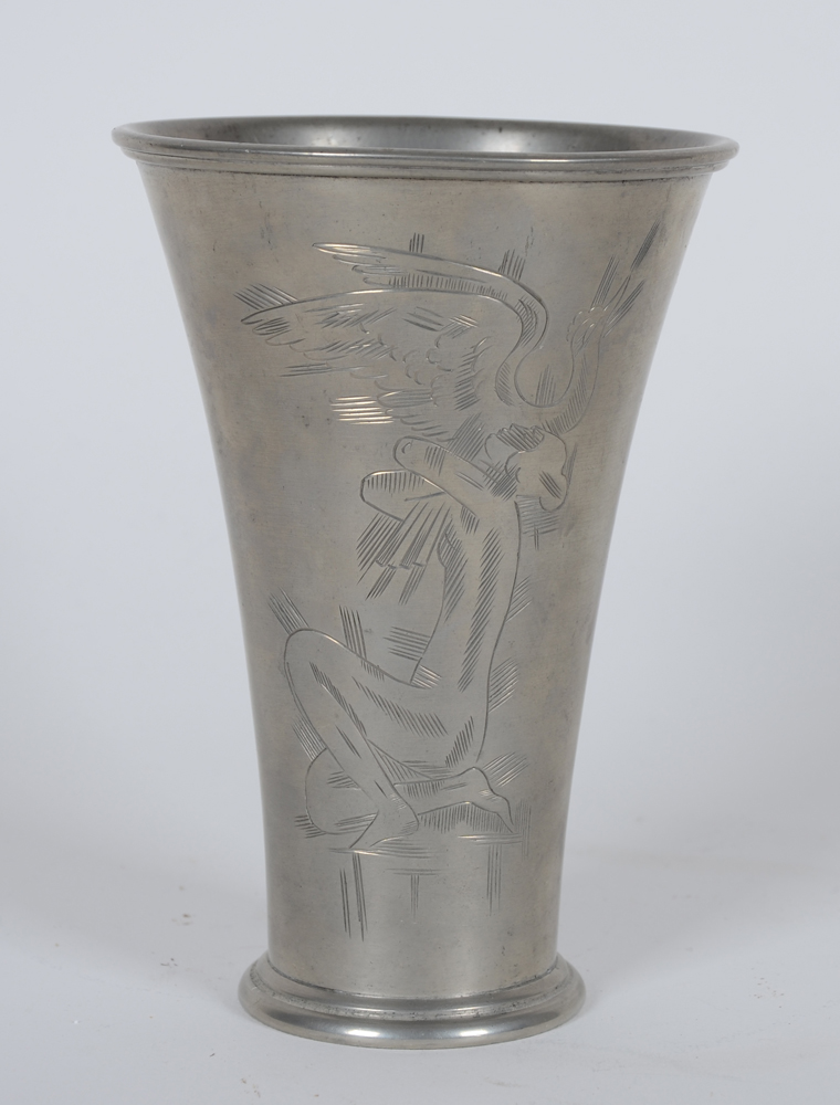 Svenskt Tenn — A typical Scandinavian beaker, with engraved decoration of a sitting nude and a bird, in pewter, marked on the bottom.