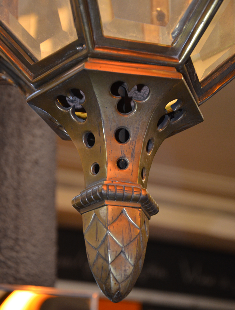 An impressive bronze hall lantern ca. 1920 — Detail of the pineapple shaped final at the bottom