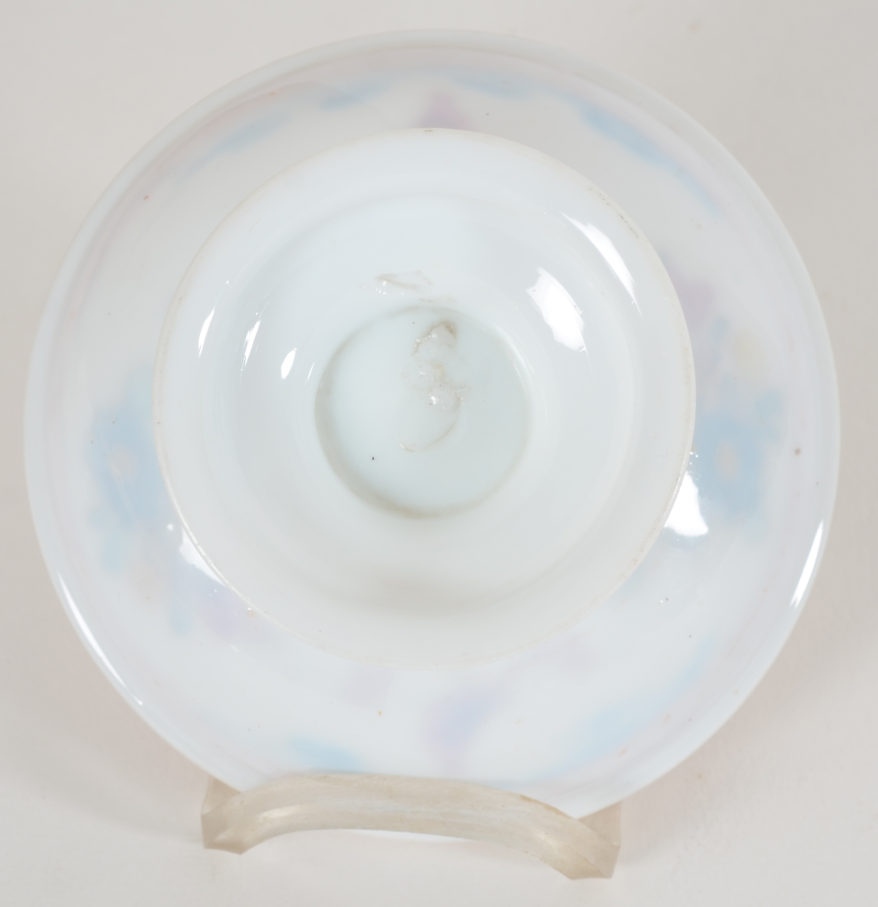 A probably 18th Century white glass (opaline) tazza, painted with flowers and doves — <p>Back of the dish</p>
