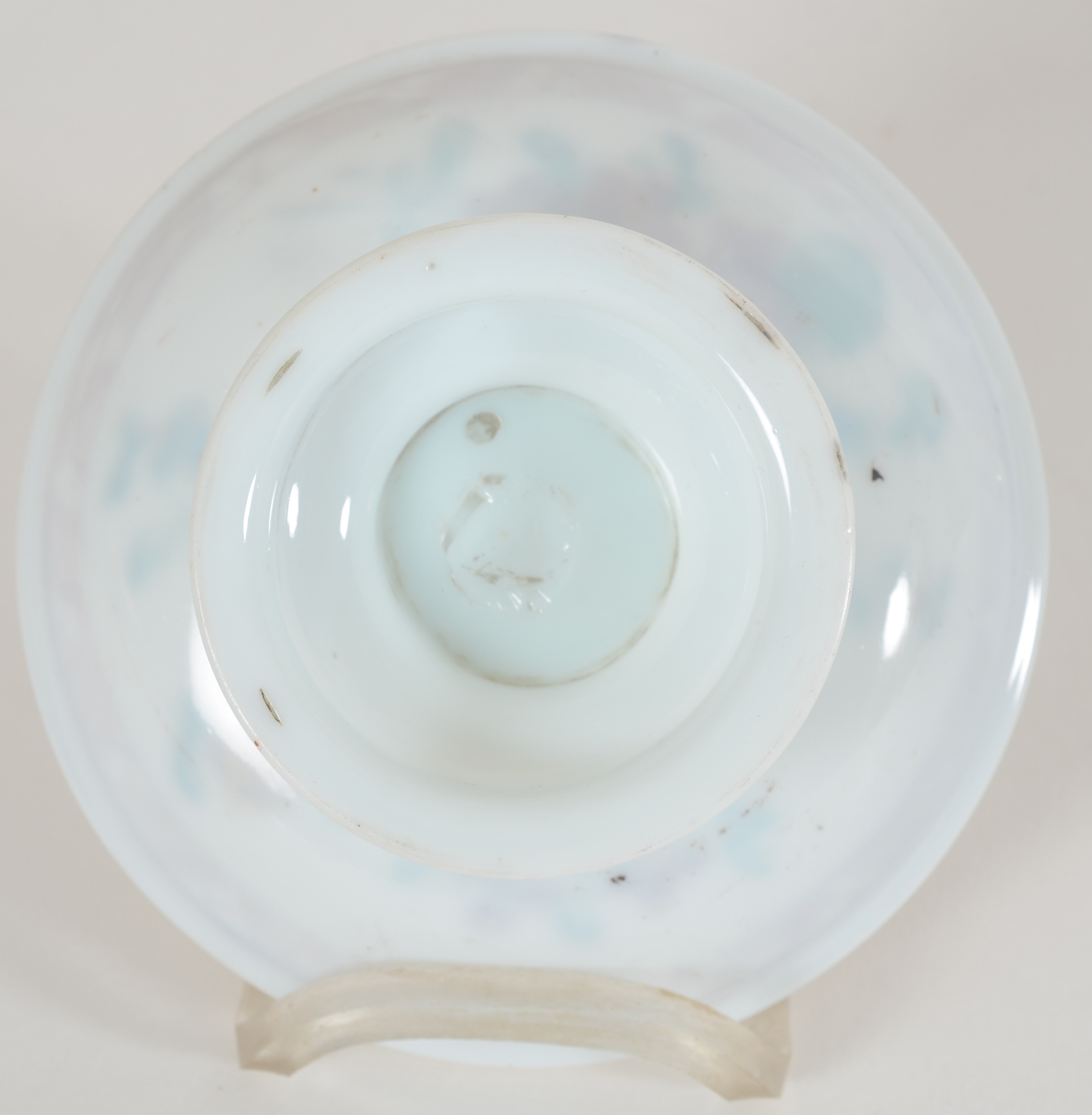 A probably 18th Century white glass (opaline) tazza, painted with flowers — <p>Back of the dish</p>