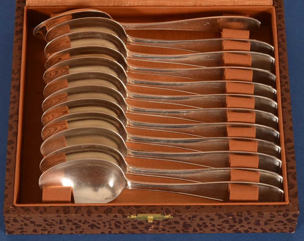 Wolfers Frères  — the set of silver spoons in their box