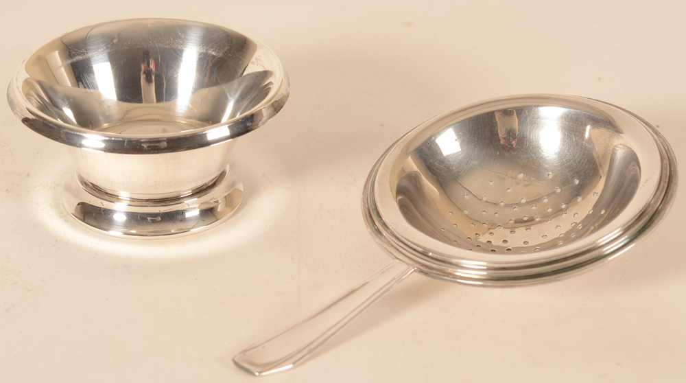 Wolfers Frères — Strainer and support, both in silver