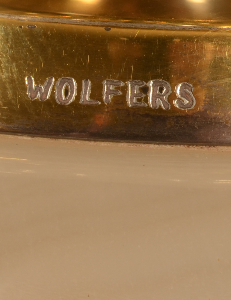Wolfers Frères SA — Retail mark on the standing rim