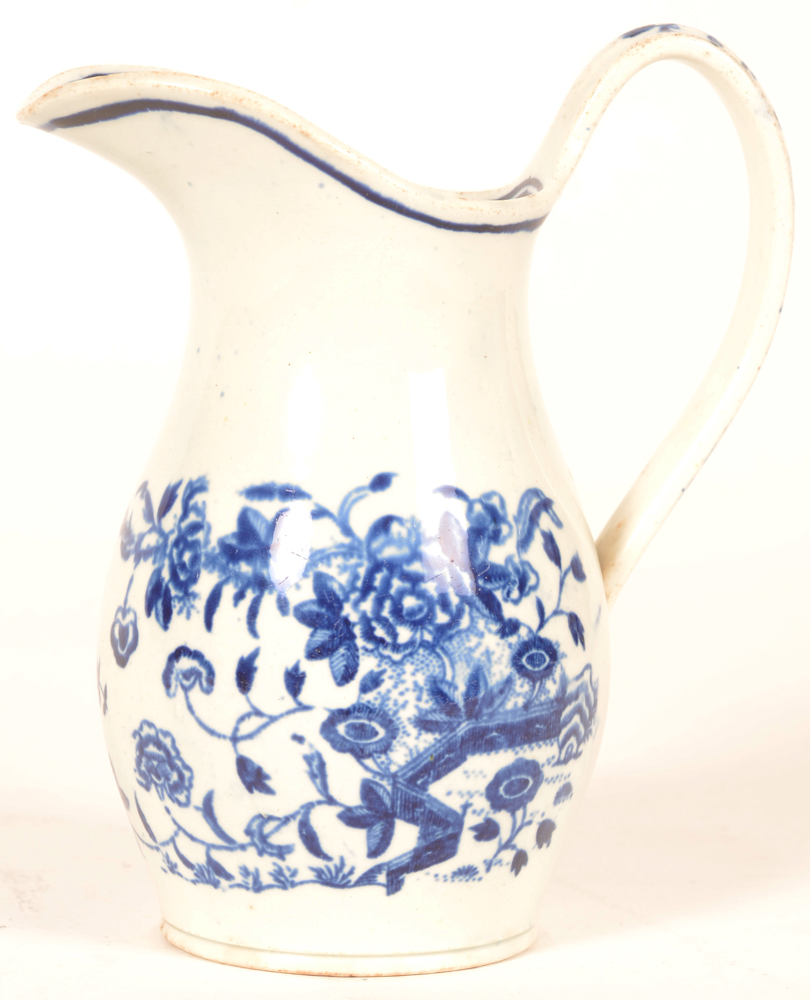 18th century Worcester porcelain milk jug — in 1st period transfer printed underglaze blue fence pattern