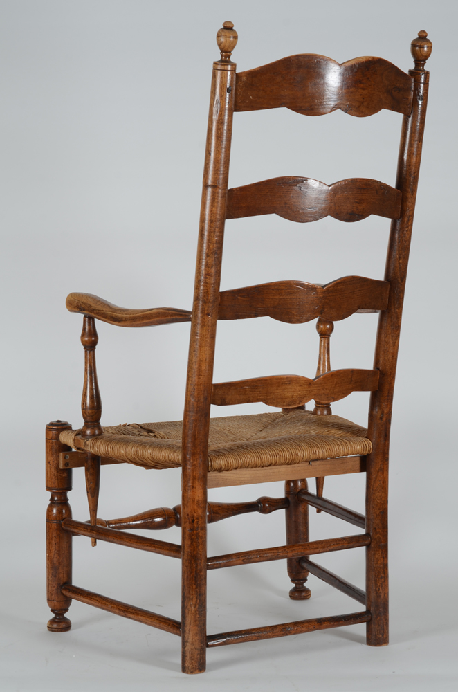 A High back arm chair, turned wood (elm?), Belgian folk art from around 1850 — View from the back
