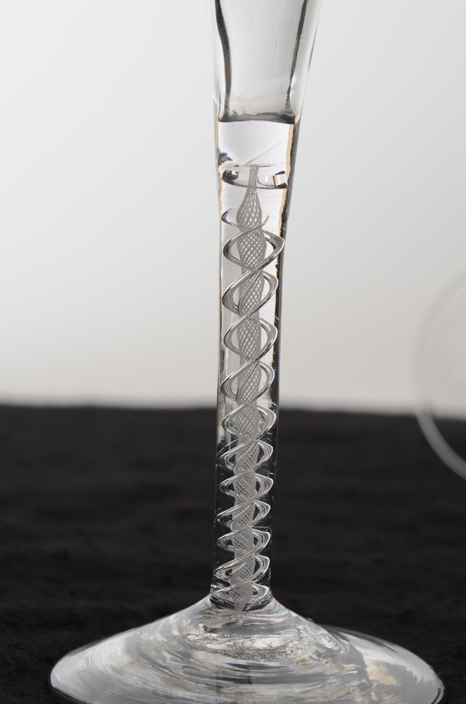 4 English air twist flute wine glasses, 18th century — Detail of the twisted stem pattern