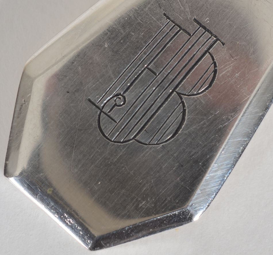 Delheid Frères (Brussels) — the elegant art deco engraving on the back