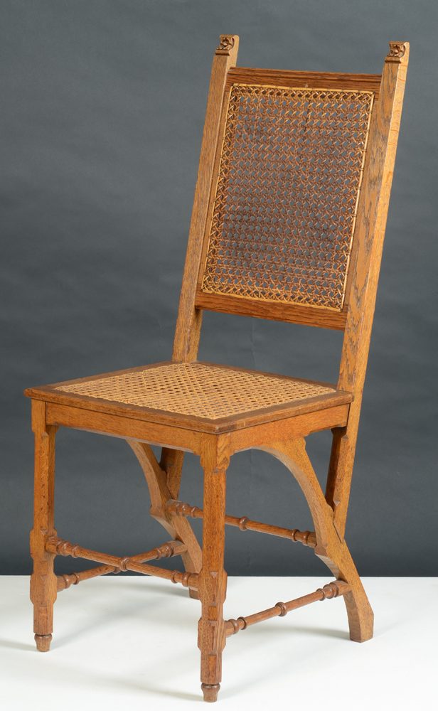 Matthias Zens — One of a set of six dining room chairs in oak, in Gothic Revival style.