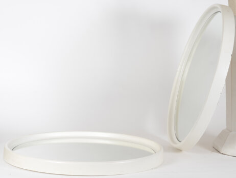 A pair of circular vintage resin mirrors, 1960-1970's
