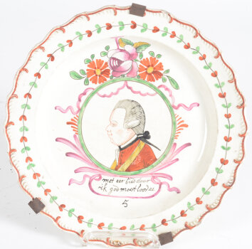 A probably Leeds creamware 'Oranjebord' with a portrait of Willem V of Orange, late 18th century