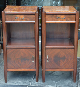 A pair of art deco night stands in mahogany and onyx marble