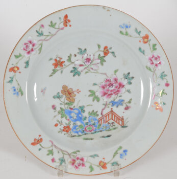 Chinese Famille Rose porcelain plate with flowers and a garden fence