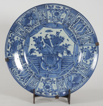 A large blue and white Arita charger