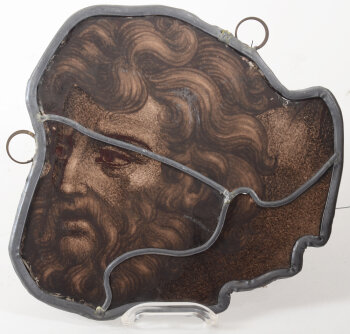 A stained glass fragment depicting a bearded man (St-Jozef?)