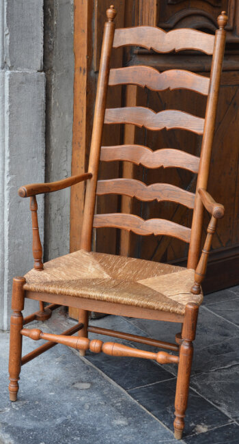 A vernacular High back arm chair, Belgium, 19th century
