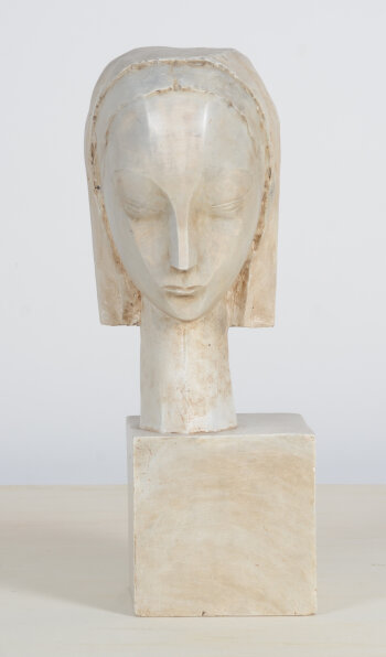 Emile Poetou Head on cube, an original patinated plaster sculpture, ca. 1929
